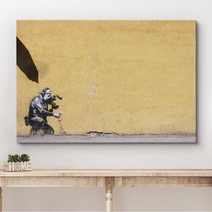 Camera Man With Flowers Canvas Art by Banksy